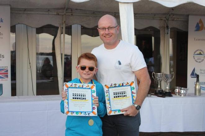 Tom and Stuart Phillips, winners of the Parent and Child Handicap – Learning and Skills Solutions Pyefleet Week ©  Mandy Bines